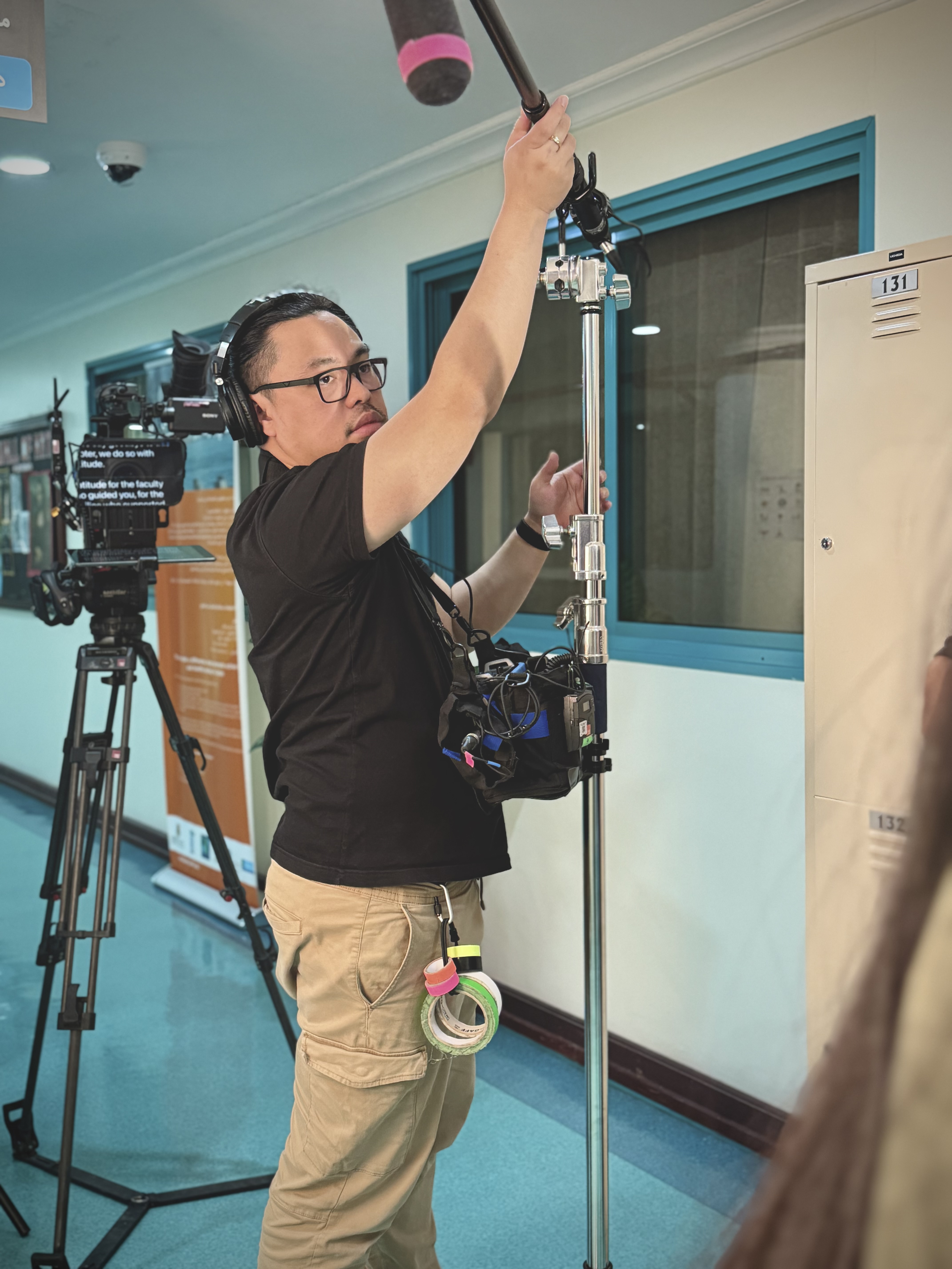 Boom microphone and location recording setup on a film production